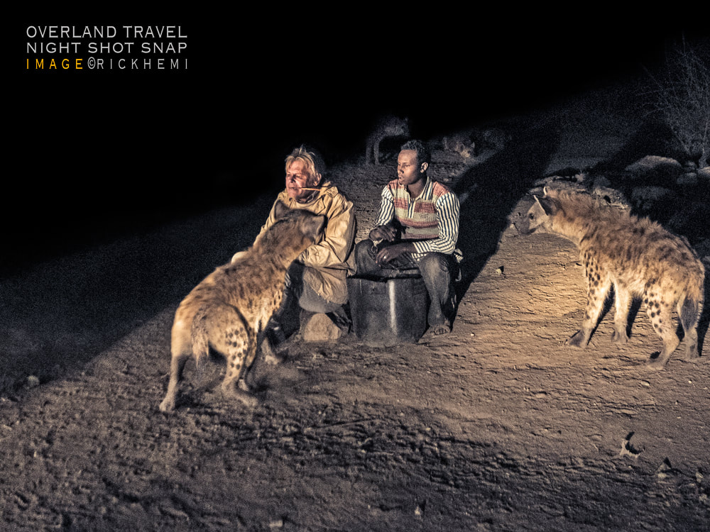 offshore solo overland travel, night feeding wild hyena, image by Rick Hemi