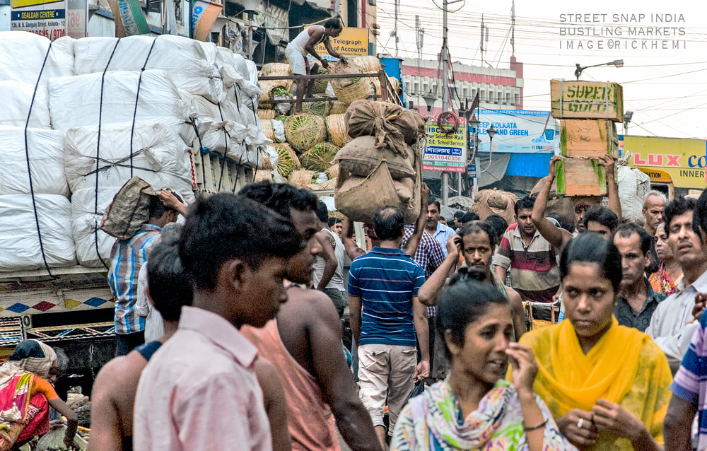 solo overland travel Asia, bustling street scene India, DSLR snap by Rick Hemi 
