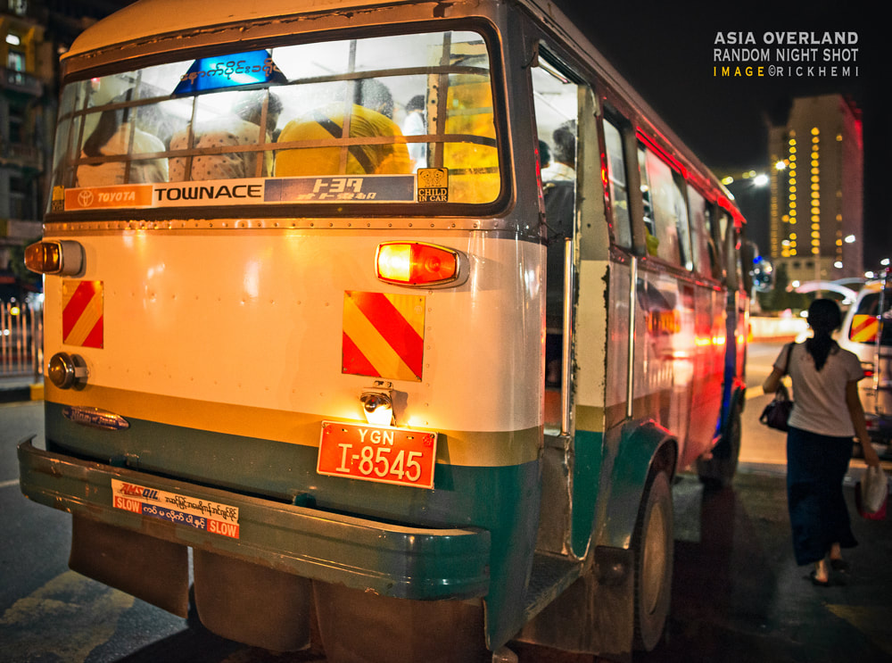 Asia solo overland travel, night street DSLR image by Rick Hemi