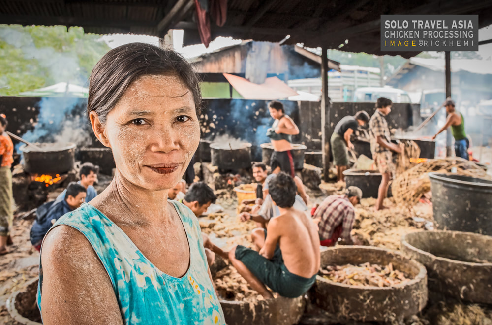 solo travel Asia, local chicken processing, image by Rick Hemi 