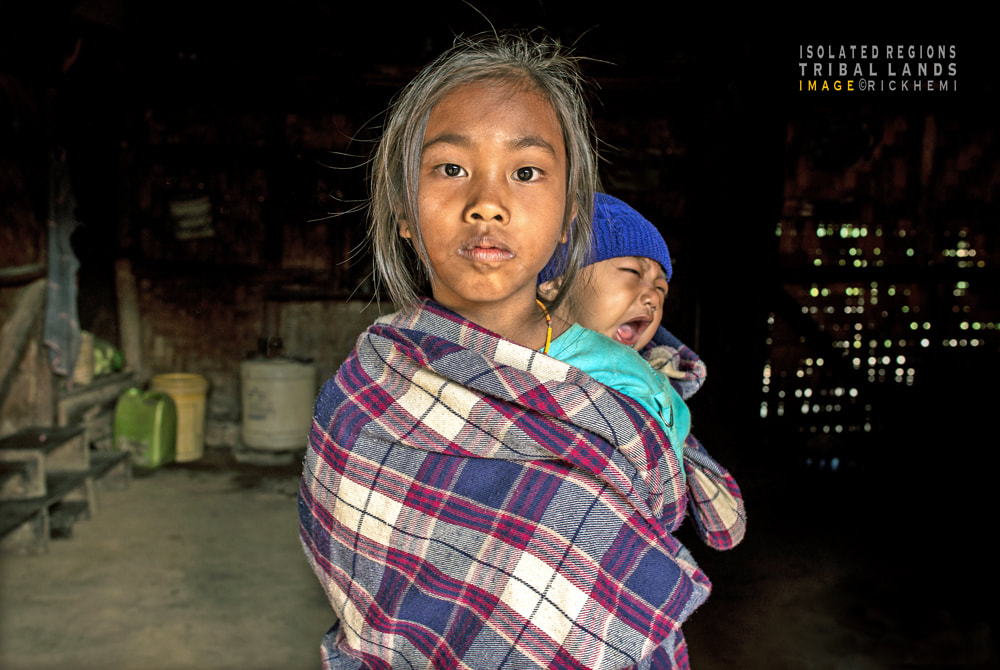 Asia solo overland street photography, tribal lands portrait, DSLR image by Rick Hemi 