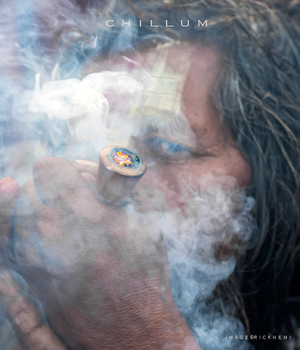 solo overland travel India, sadhu chillum smoking, street photography India, image by Rick Hemi  
