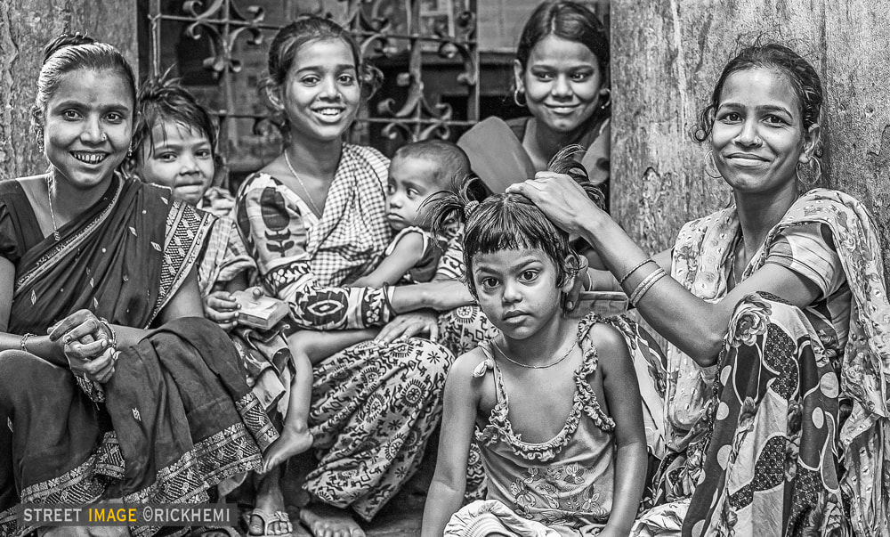 overland travel India, street group portrait, image by Rick Hemi