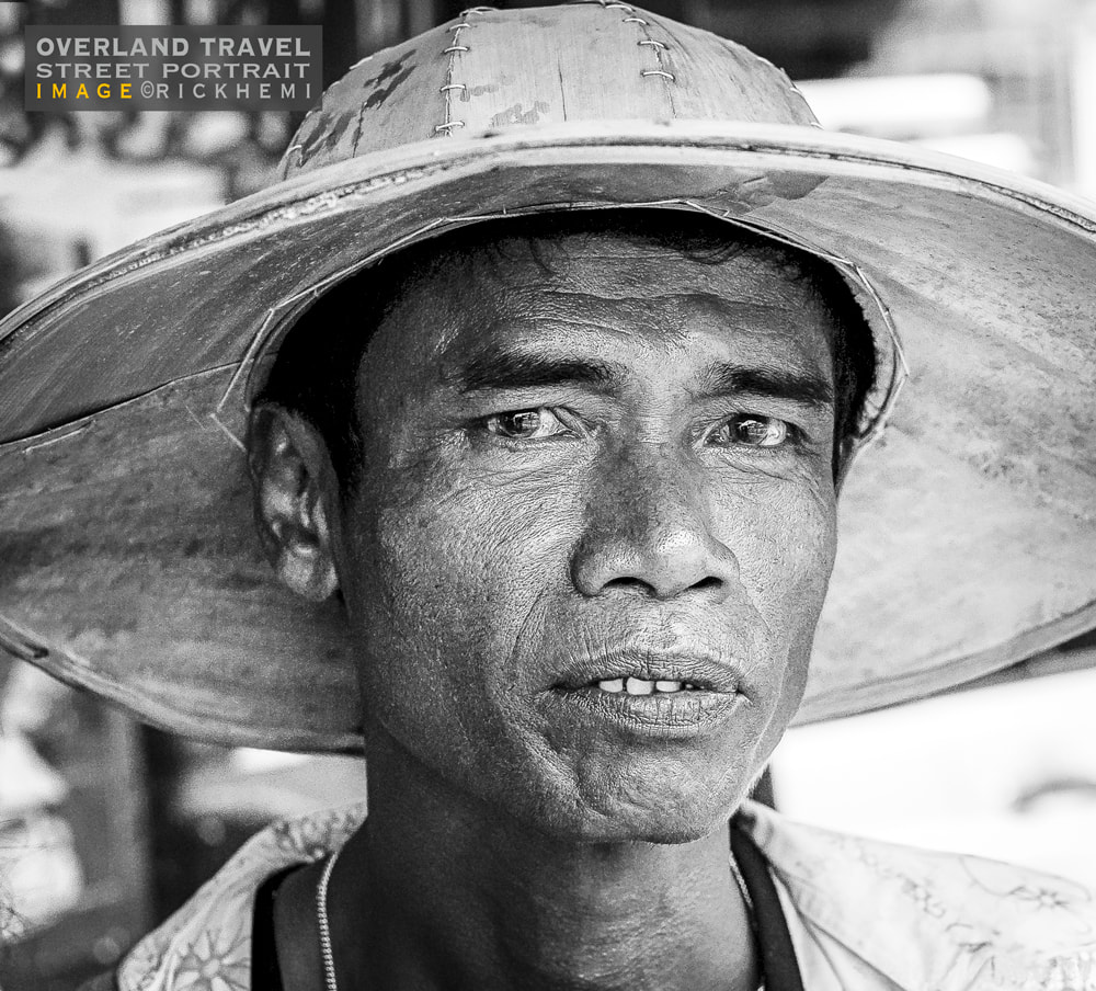 solo overland travel offshore, street portrait snap, image by Rick Hemi