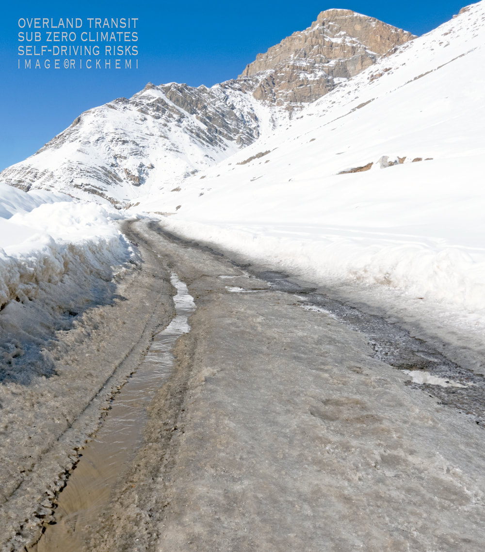solo overland travel and transit self driving, midwinter black ice, extreme isolated snow clad road routes, Himalaya, Patagonia, Andes, image by Rick Hemi 