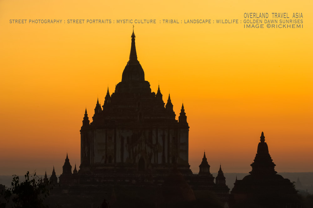 solo overland travel Asia, simple silhouette, golden dawn, image by Rick Hemi