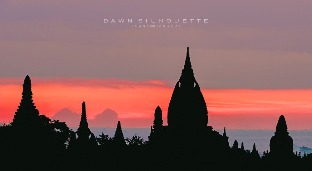 solo overland travel Asia, pink dawn silhouette, image by Rick Hemi