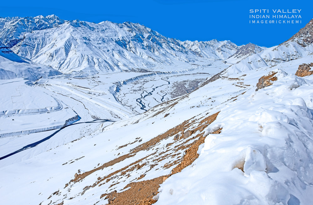 overland travel India, Indian Himalaya midwinter, Spiti valley blanket of snow view, DSLR image by Rick Hemi