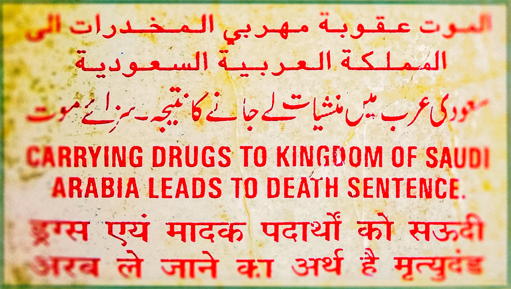solo overland travel Middle East, Saudi drug warning notice, image by Rick Hemi 