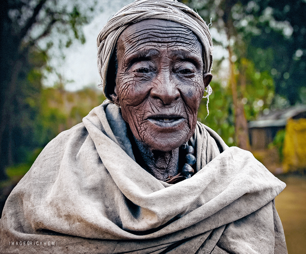 solo overland travel Africa, 100+ year old street portrait, image by Rick Hemi