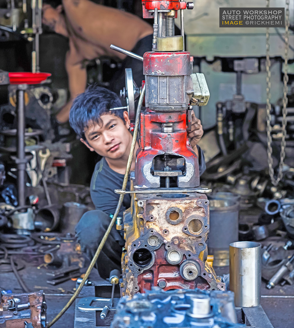 street photography Asia, automotive workshop repair, Image by Rick Hemi 