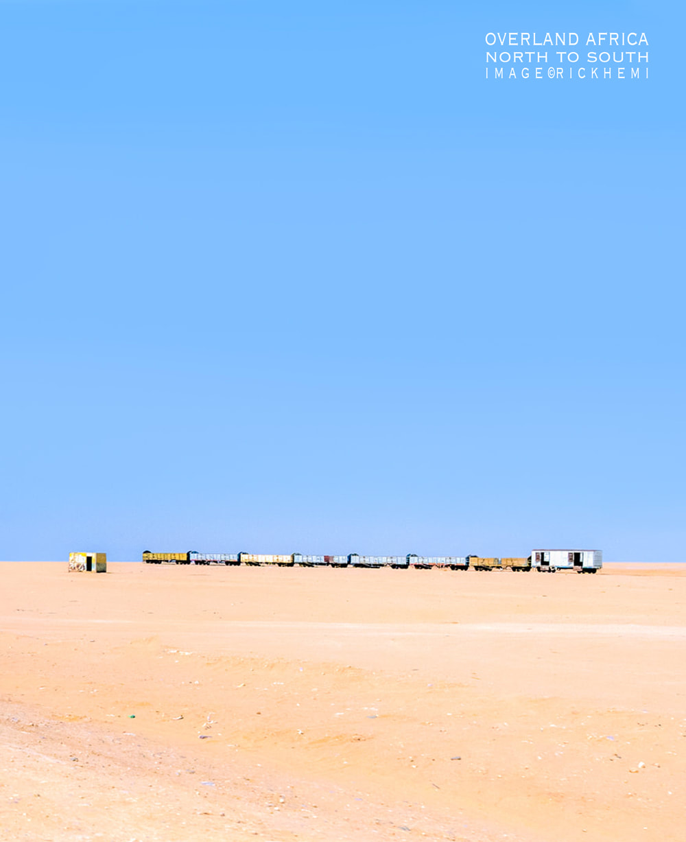 solo overland travel northern Africa, DSLR desert roadside snap, image by Rick Hemi