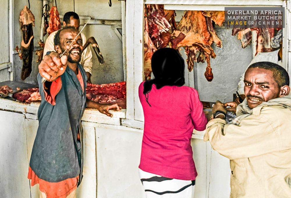 overland travel Africa, rural market butcher, image by Rick Hemi