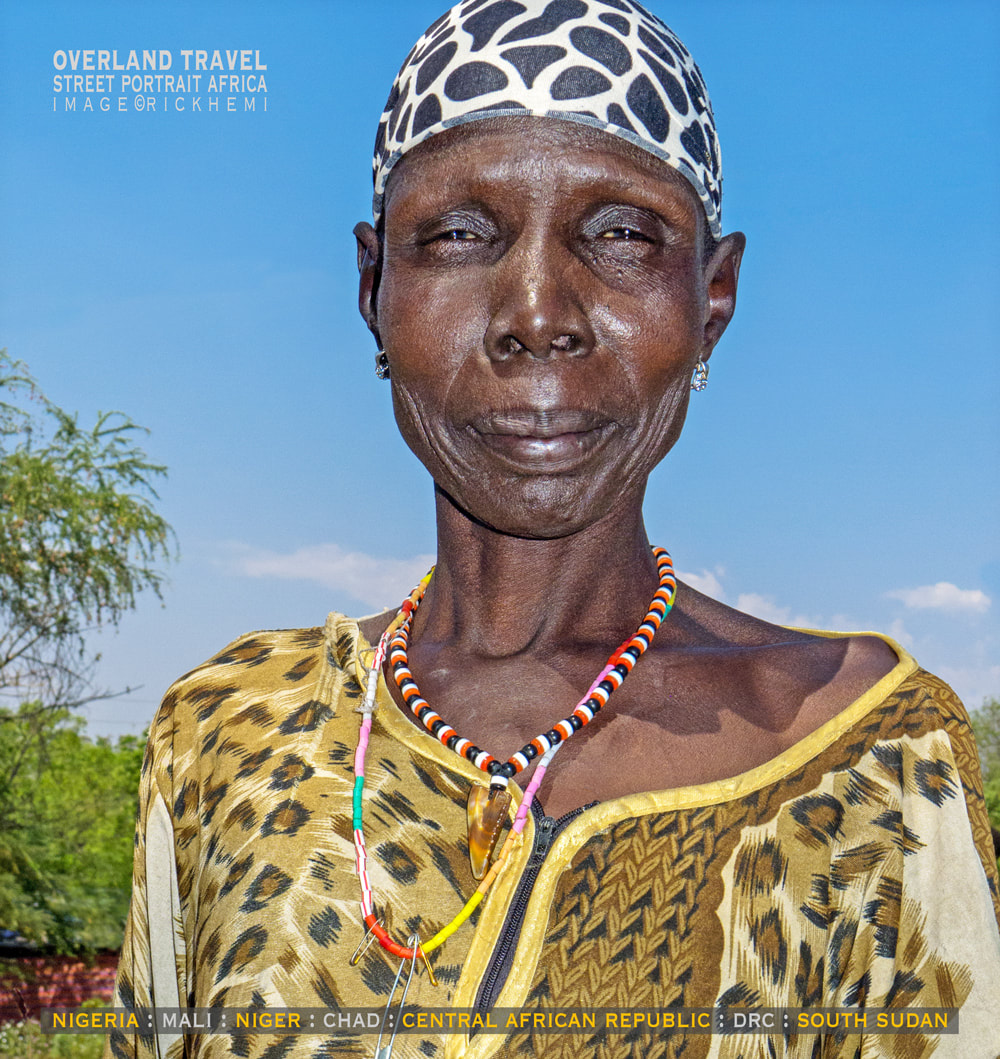Solo overland travel Africa, random street portraits west central Africa, image by Rick Hemi  