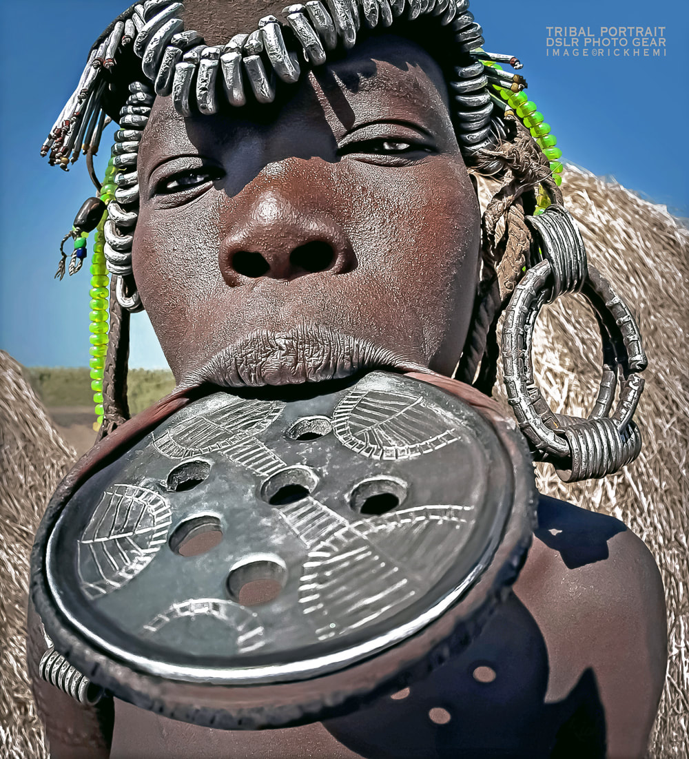 solo overland travel Africa, indigenous tribal Africa, Lip plated Mursi, DSLR image by Rick Hemi