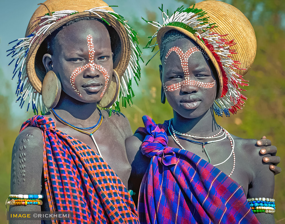 solo overland travel Africa, tribal sisters, DSLR portrait Africa, image by Rick Hemi