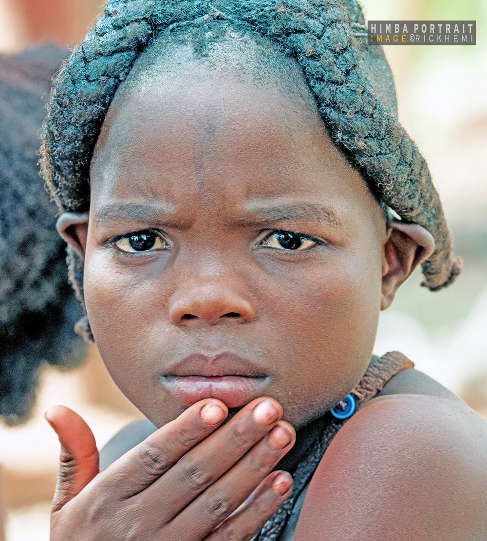 solo overland travel Africa, tribal lands, portrait DSLR image by Rick Hemi