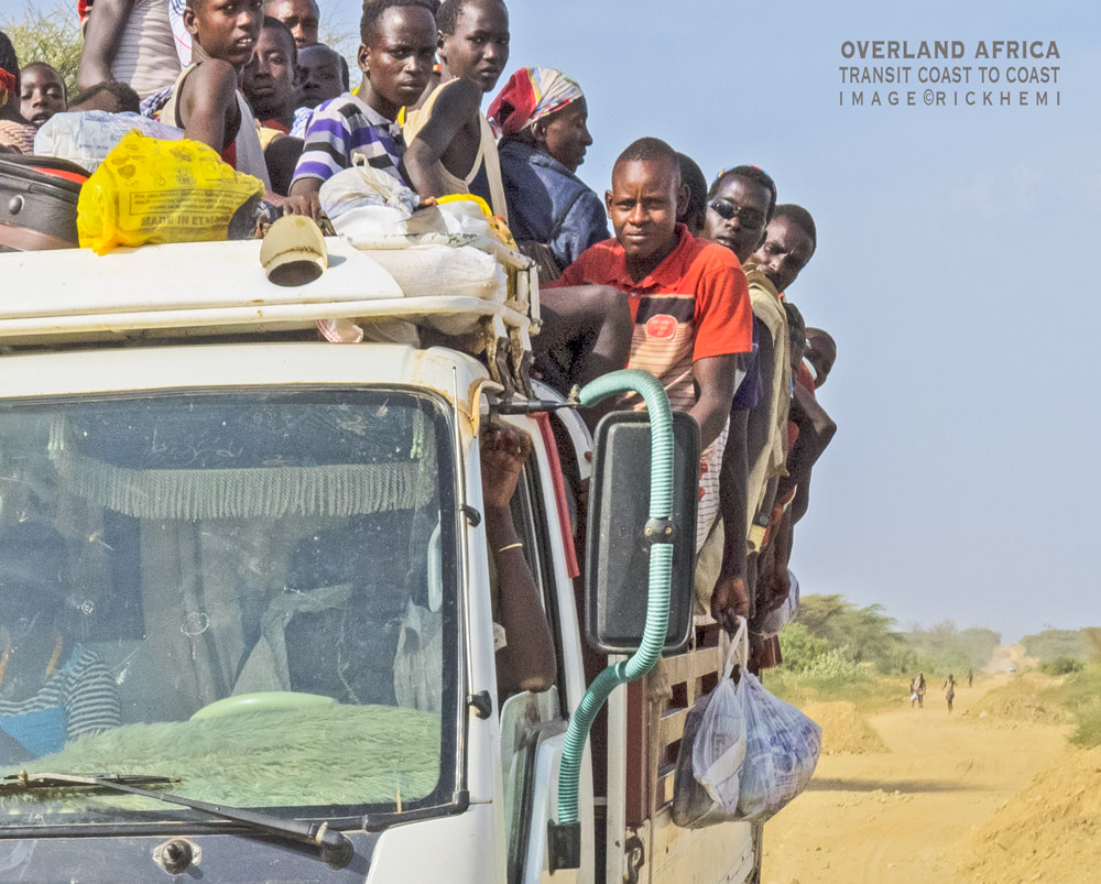solo overland travel and transit Africa, on the go in transit heartland Africa, image by Rick Hemi