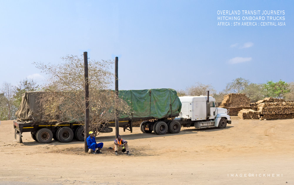 solo overland travel offshore, hitching random lifts onboard trucks through Africa, image by Rick hemi