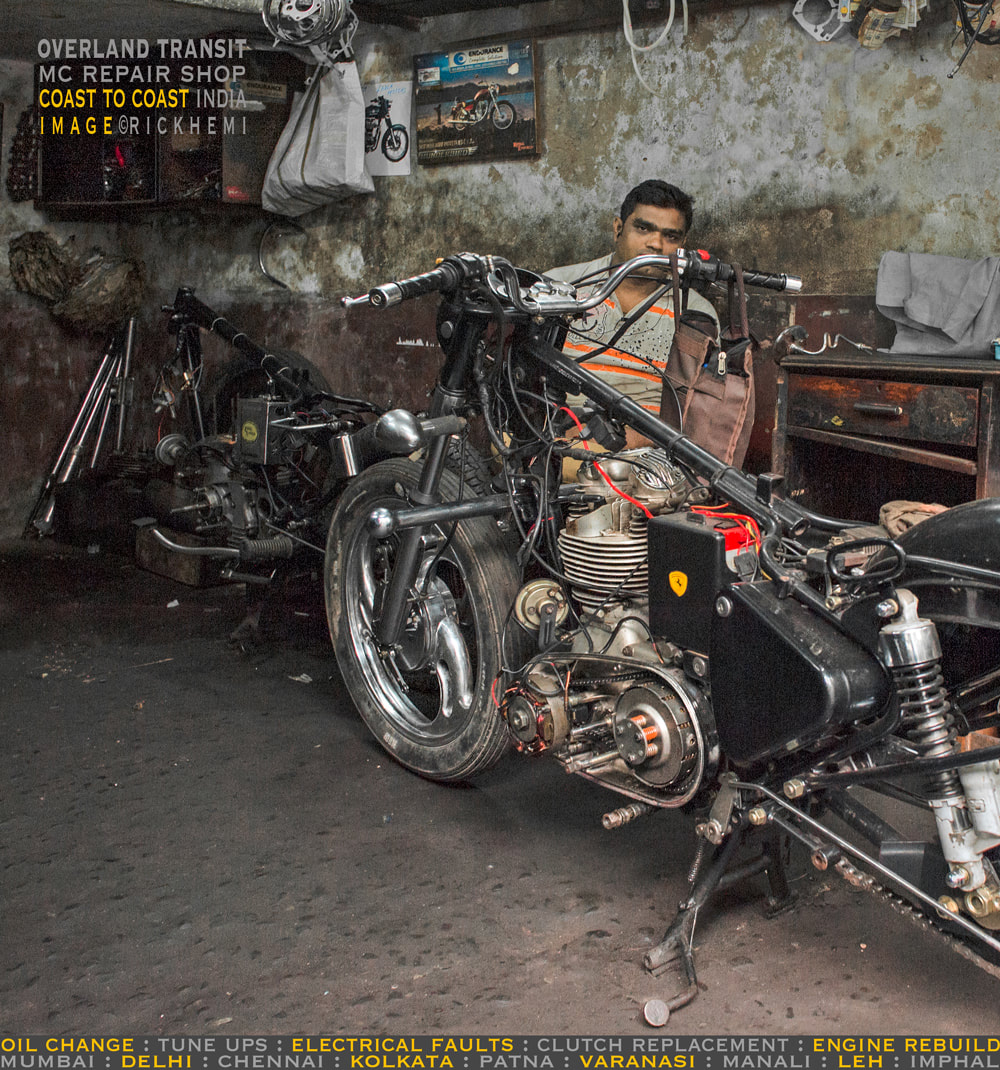 solo overland travel and transit, MC repair shop India, image by Rick Hemi 