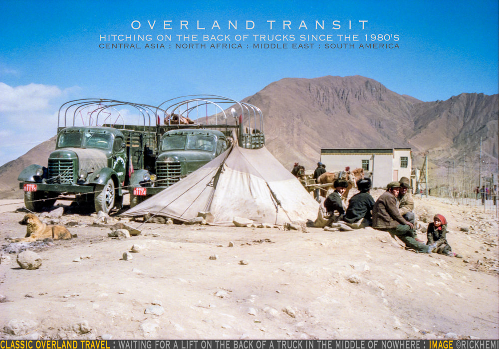 solo overland travel and transit, central Asia, north Africa, Middle East, hitching lifts on the back of trucks, classic travel and transit snap image by Rick Hemi 