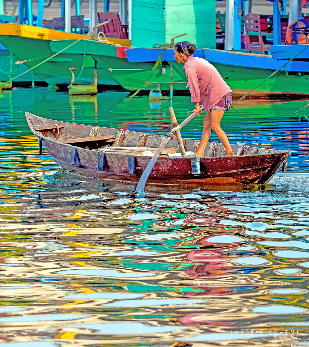 overland travel Asia, estuary reflections, image by Rick Hemi