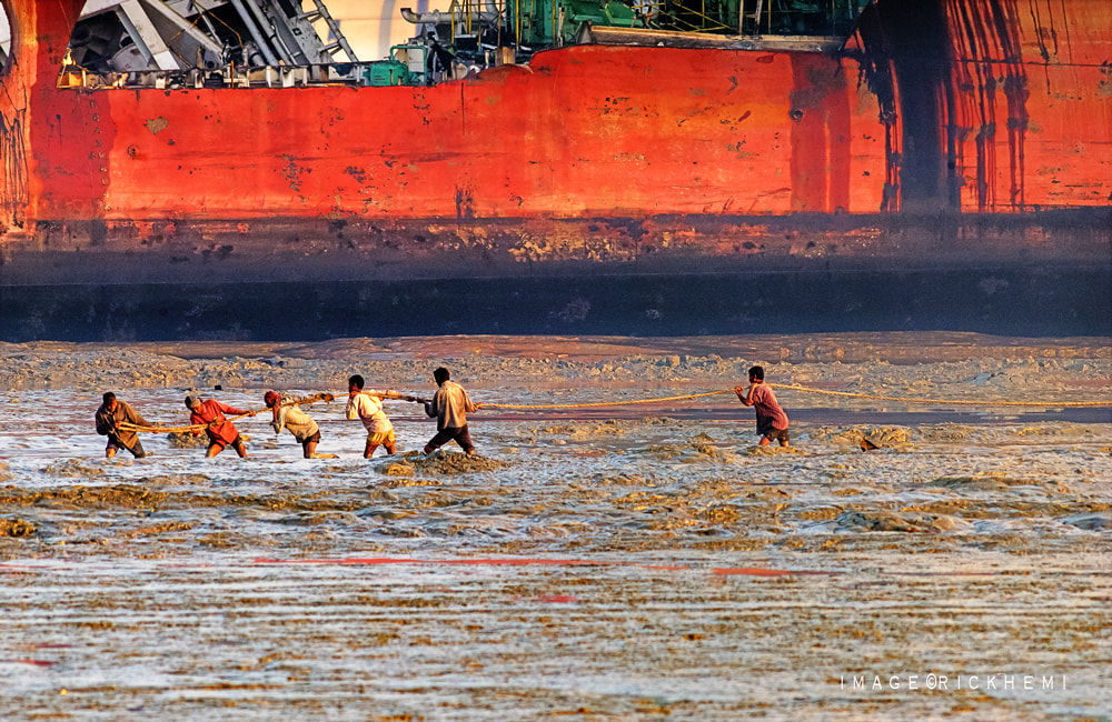 Asia overland travel photography, mudflats low tide morning crew image by Rick Hemi