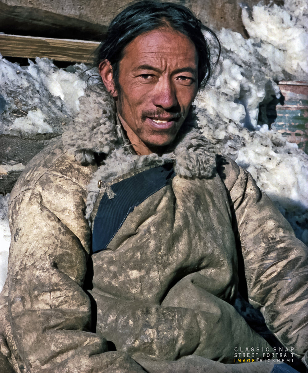 Asia, solo overland travel and transit, classic street portrait Tibet, image by Rick Hemi