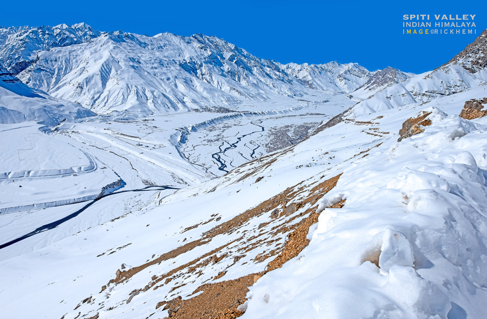 overland travel India, Indian Himalaya midwinter, Spiti valley under a blanket of snow, DSLR image by Rick Hemi