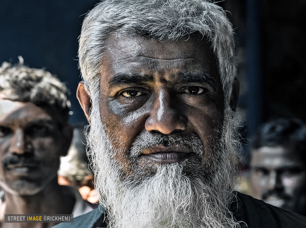 solo travel India, on the go close-up street portrait India, image by Rick Hemi