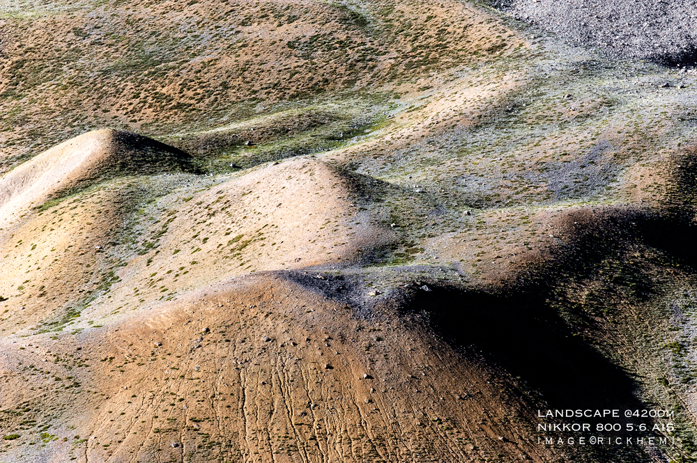 solo overland travel, landscape snap, Nikkor 800 5.6 AIS manual prime, image by Rick Hemi   