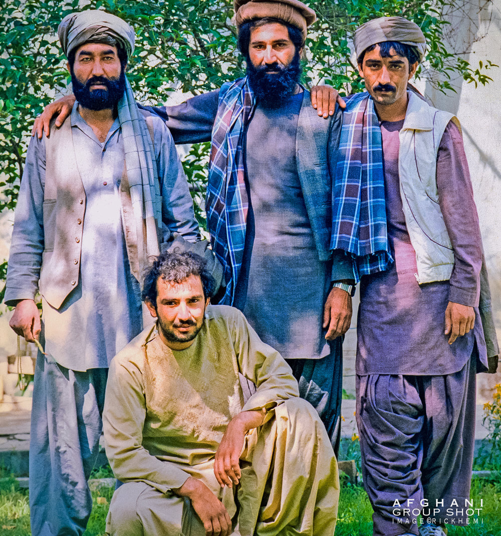 solo overland travel Mid East central Asia, Afghani group shot, image by Rick Hemi