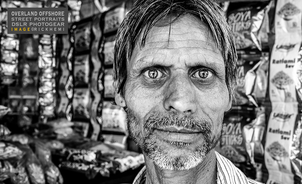 solo overland travel offshore, closeup street portraits of strangers, DSLR Nikon D3, AF 28mm f/1.4 prime lens, image by Rick Hemi