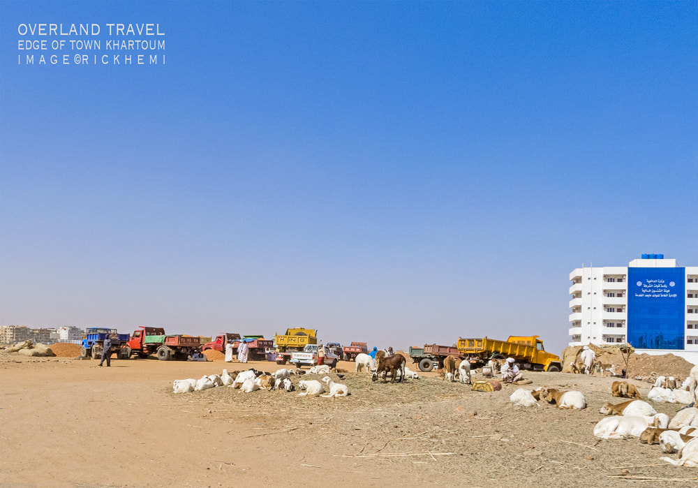 solo overland travel offshore, street snap Sudan, image by Rick Hemi