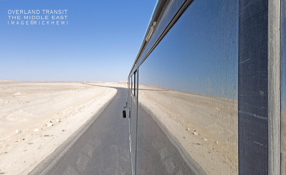 solo overland travel and transit Middle East,  bus crossing international borders, image by Rick Hemi