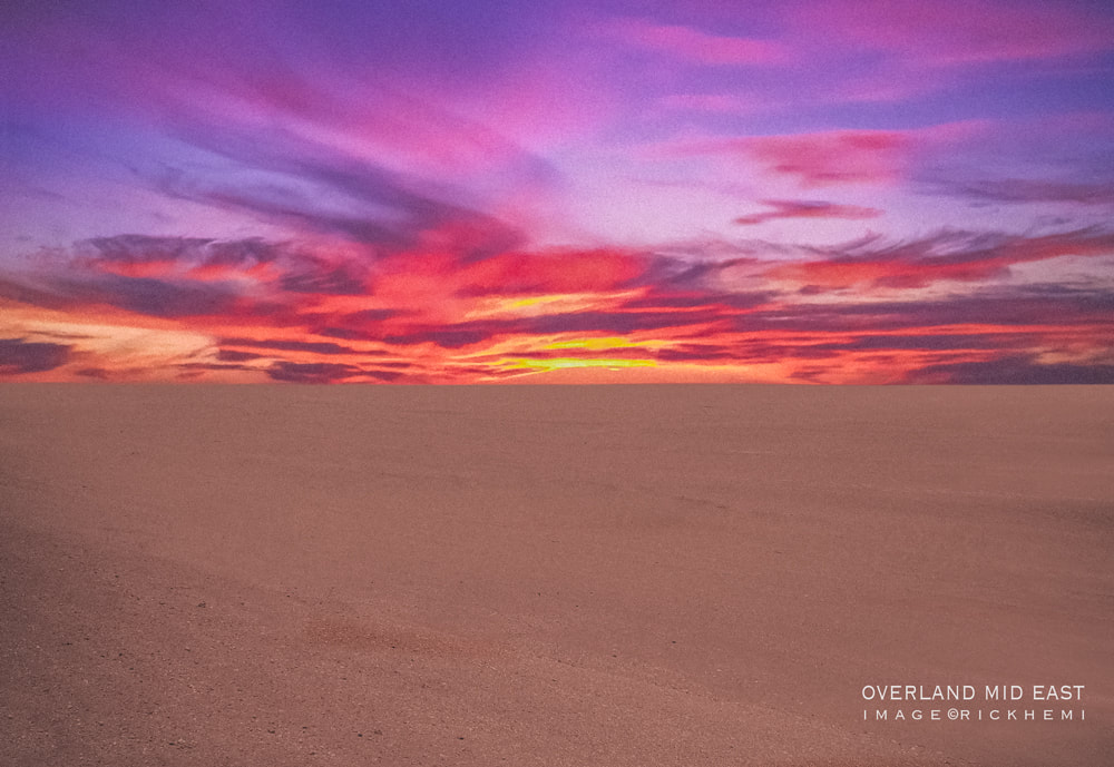 solo overland travel, solo overland Middle East, desert dusk snap mid-East, image snap by Rick Hemi