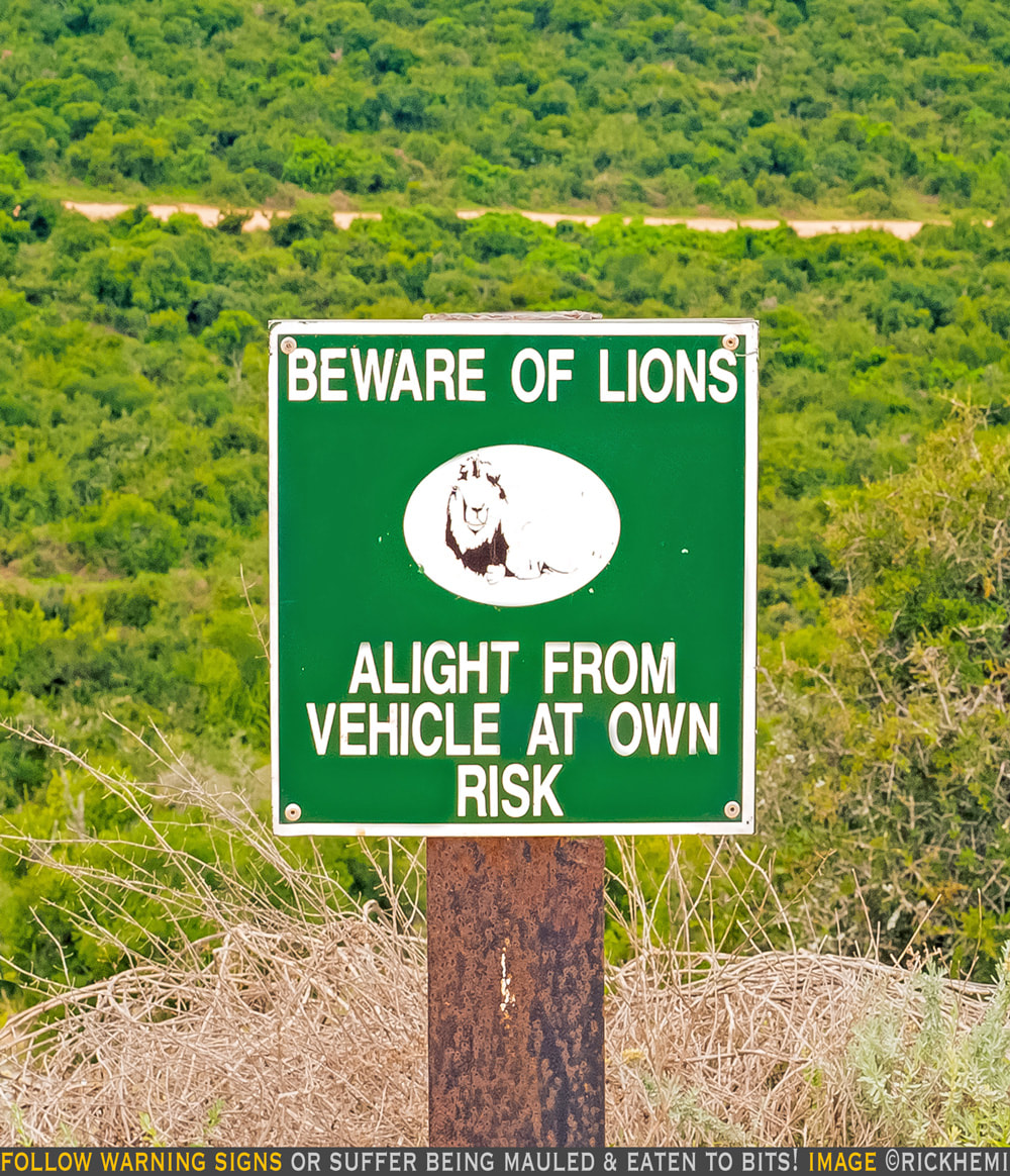 solo overland travel wildlife, wildlife national park warning sign, image by Rick Hemi 