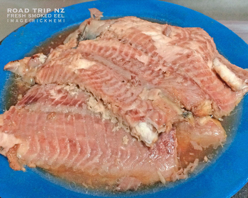 solo road trip journey through New Zealand, freshly smoked eels, image snap by Rick Hemi