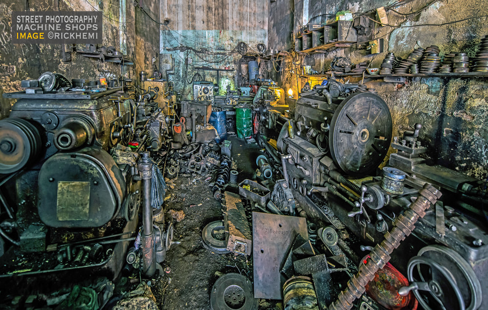 solo travel Asia, street photography Asia, machine workshop, image by Rick Hemi